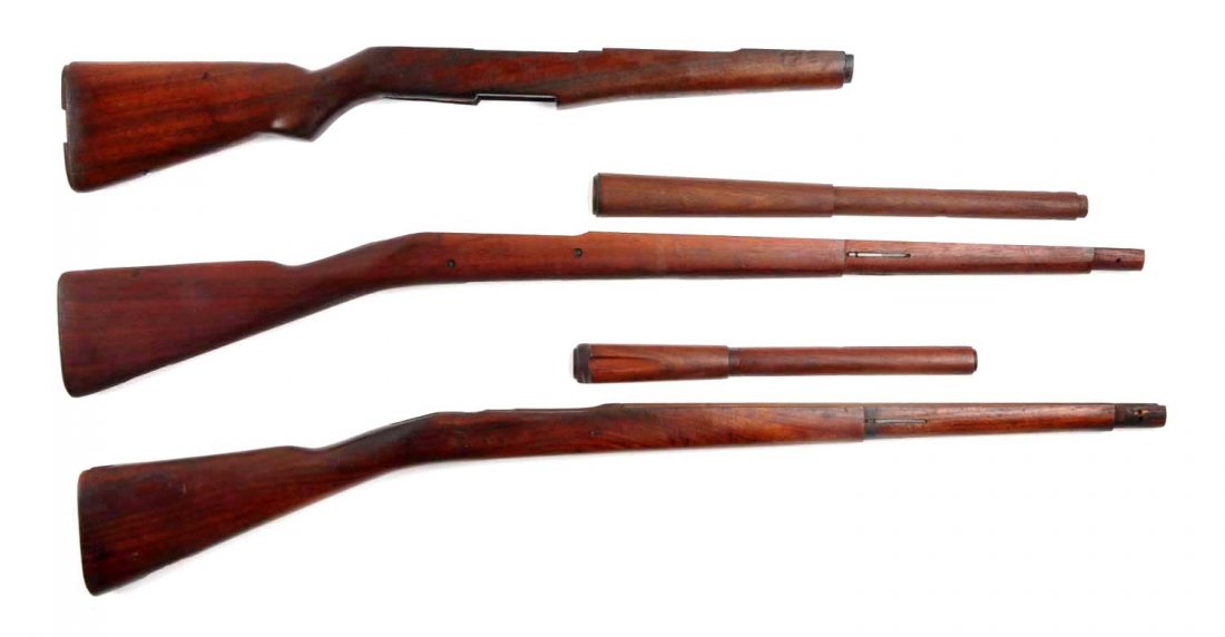 Lot Of 3: US Springfield Rifle Stocks.: Each: 39” L. A: Is a US Springfield 1903A3 with hand guard Seriff P in circle on wrist. B: Is a 1903 Springfield Stock stamped FJA has wheel, has rebuild mark, hand guard with groove. The third stoc