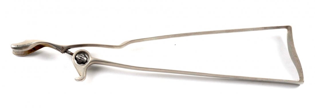 Quality Colt Reproduction Metal Shoulder Stock.: Offered is an early new exact replica of the nickel plated brass Colt adjustable skeleton stock used on the Colt Single Action cartridge revolvers. Beautifully machined and it is a dead ringer to an o