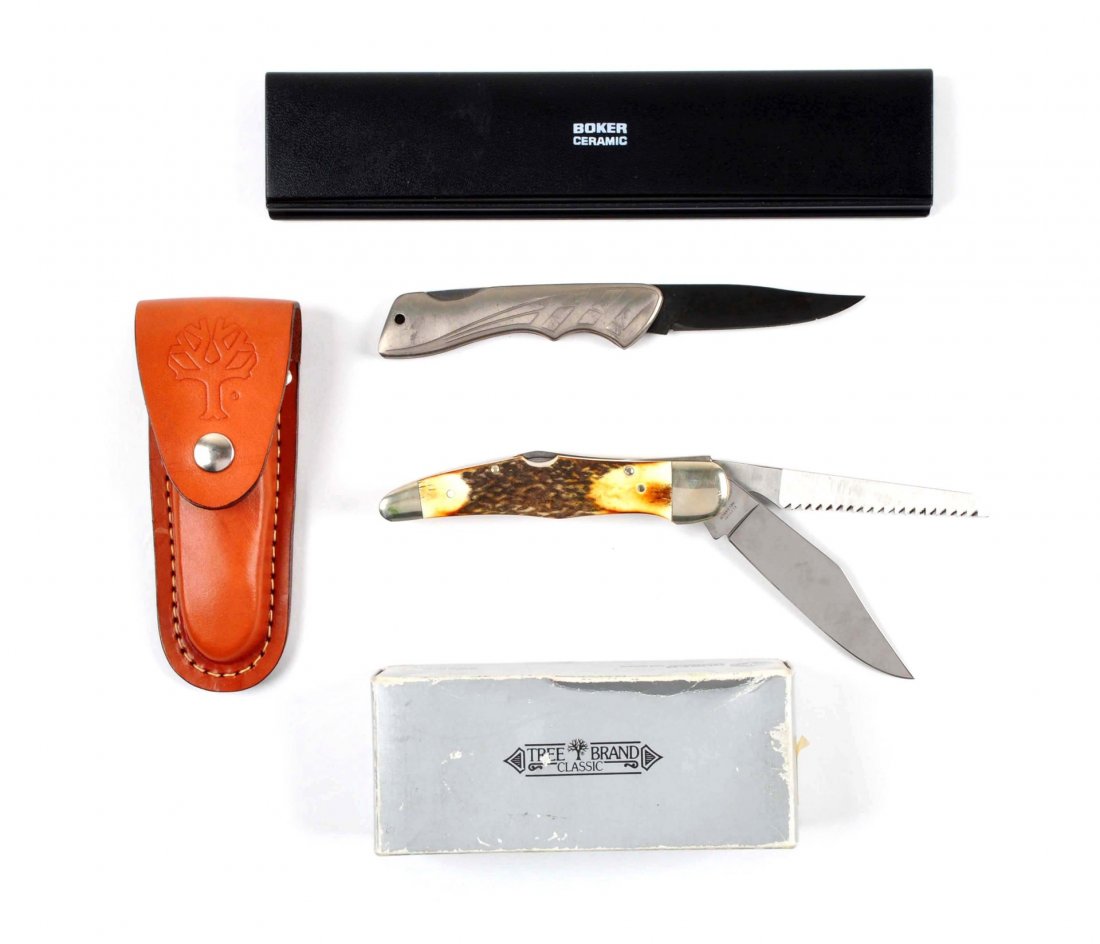 Lot of 2: Boker Folding Knives.: Mint in box Boker Ceramic 4-1/4" one-blade folder with a lock back feature. All metal handle. Knife is boxed with the paperwork on ceramic blades. Boker Tree Brand Solingen 5-1/4" two-blade hunter han