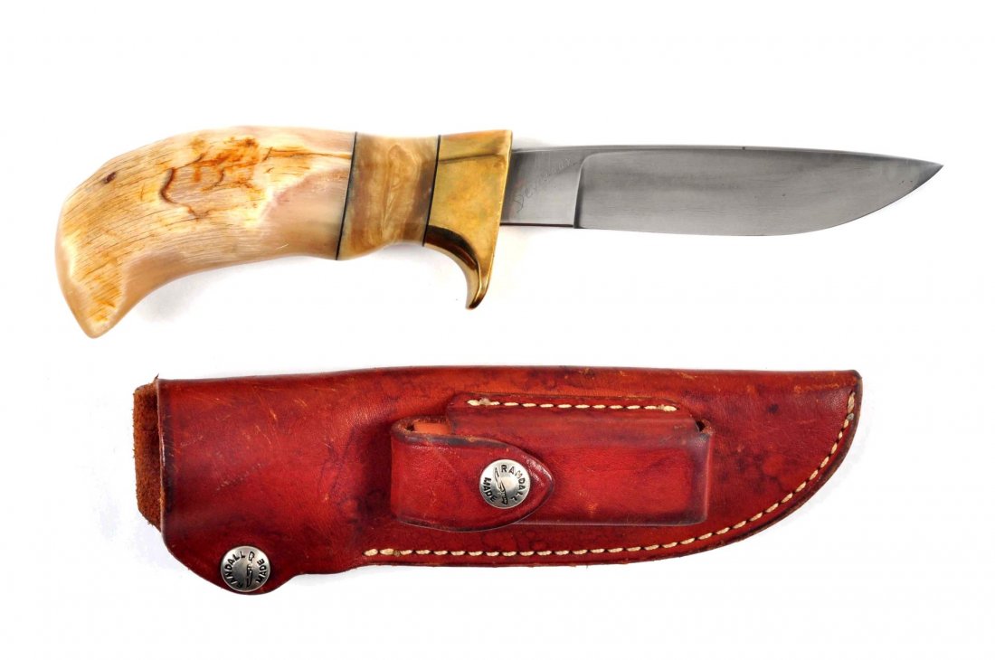 Custom Fixed Blade by Deveraux.: Deveraux custom-made hunting knife. Spear point blade measures 4-5/8" with an overall 9-1/2". Beautiful sectioned sheep horn handle with brass mount. Hand tooled leather sheath marked "Rowe's Leather 