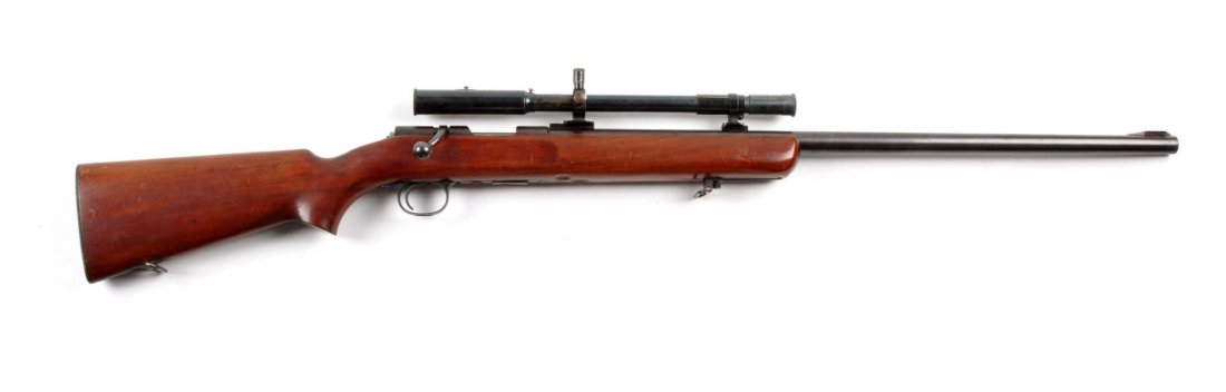 (C) Remington Rangemaster .22 Target Rifle: Serial # 01129 Caliber .22 LR, Barrel length 28". Manufactured 1937-1940 only. Features 28" heavy barrel with target sights and telescopic bases. Rifle has had the rear peep sight and front sight remo