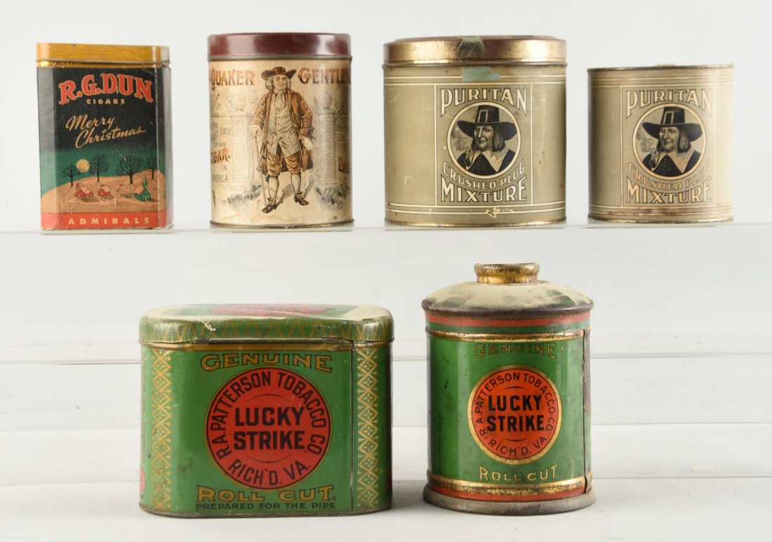Lot of 6: Early Tobacco Tins.: Included in this lot is a RG Dunn cardboard wrapped tin, a Quaker Gentleman paper label wrapped tin, two Puritan Crushed Plug Mixture tins and two Lucky Strike Tobacco tins. Tins range in condition fr