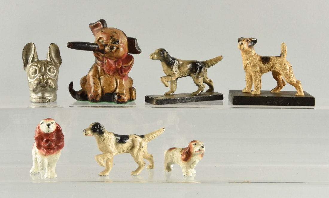 Lot Of 7: Cast Iron Assorted Dog Paperweights.: By Hubley, Wilton, and John Wright. Condition (Very Good - Excellent). Size Largest: 4 - 1/2" T.