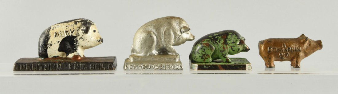 Lot Of 4: Cast Iron Ast. Adv. Pig Paperweights. (1 of 1)