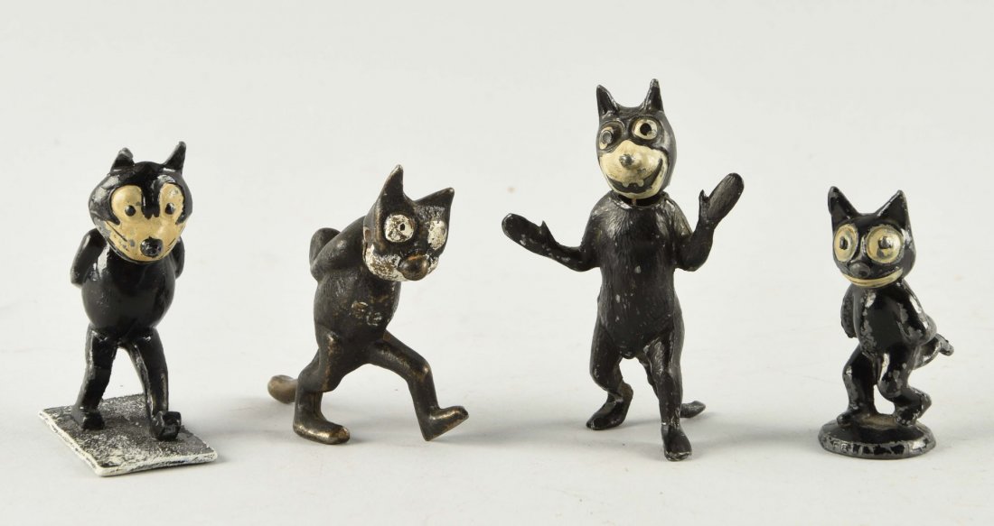 Lot Of 4:Cast Iron Felix the Cat Paperweight Toys. (1 of 1)