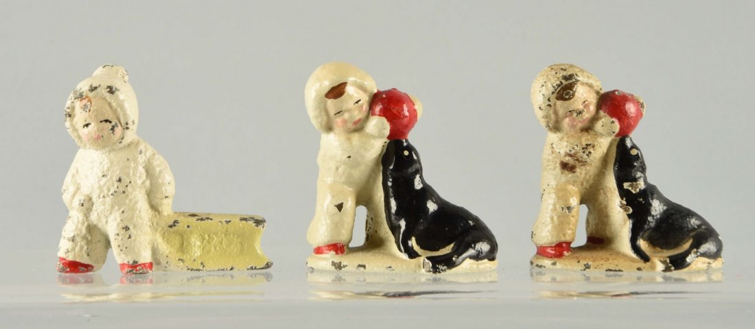 Lot Of 3: Cast Iron Snow Baby Paperweights. (1 of 1)