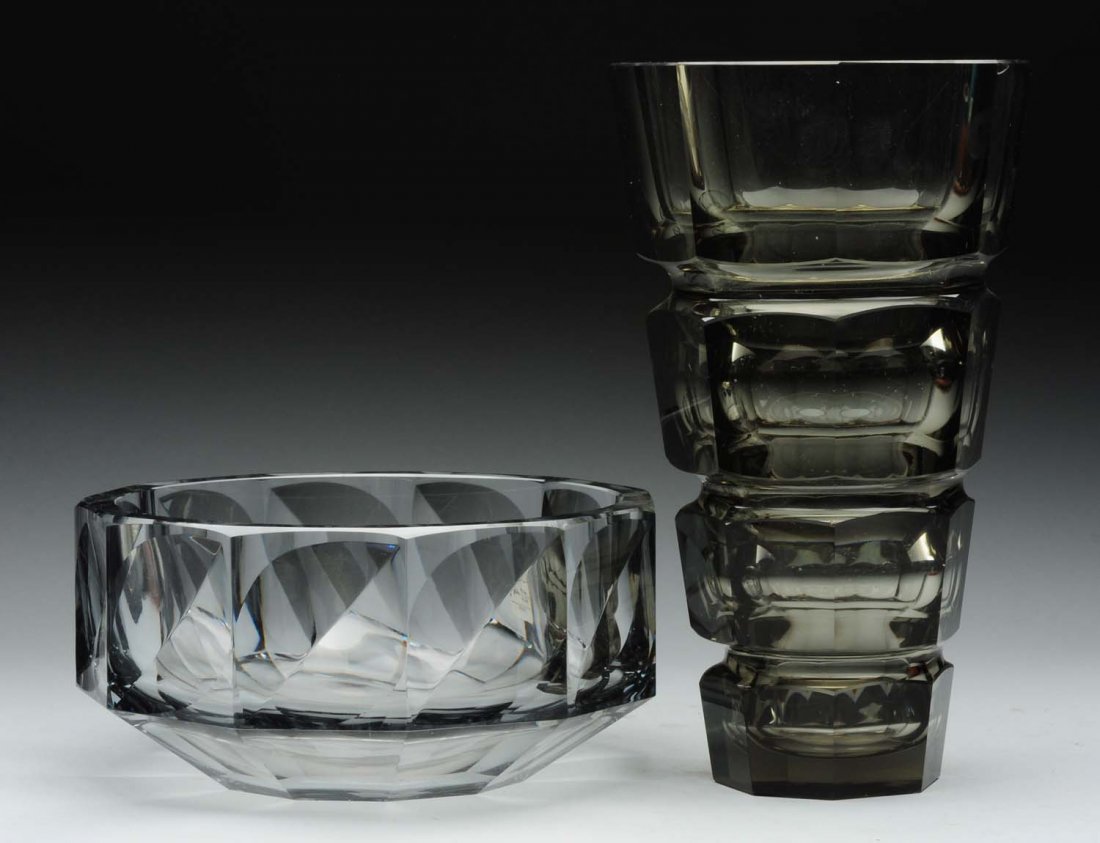 Lot Of 2: Orrefors Cut Glass.: Signed 8" diameter bowl in excellent condition and a 10" tall vase, unsigned, with tiny flea bite chip on the bottom. Condition (Excellent). Size Largest : 10 -1/4" T.