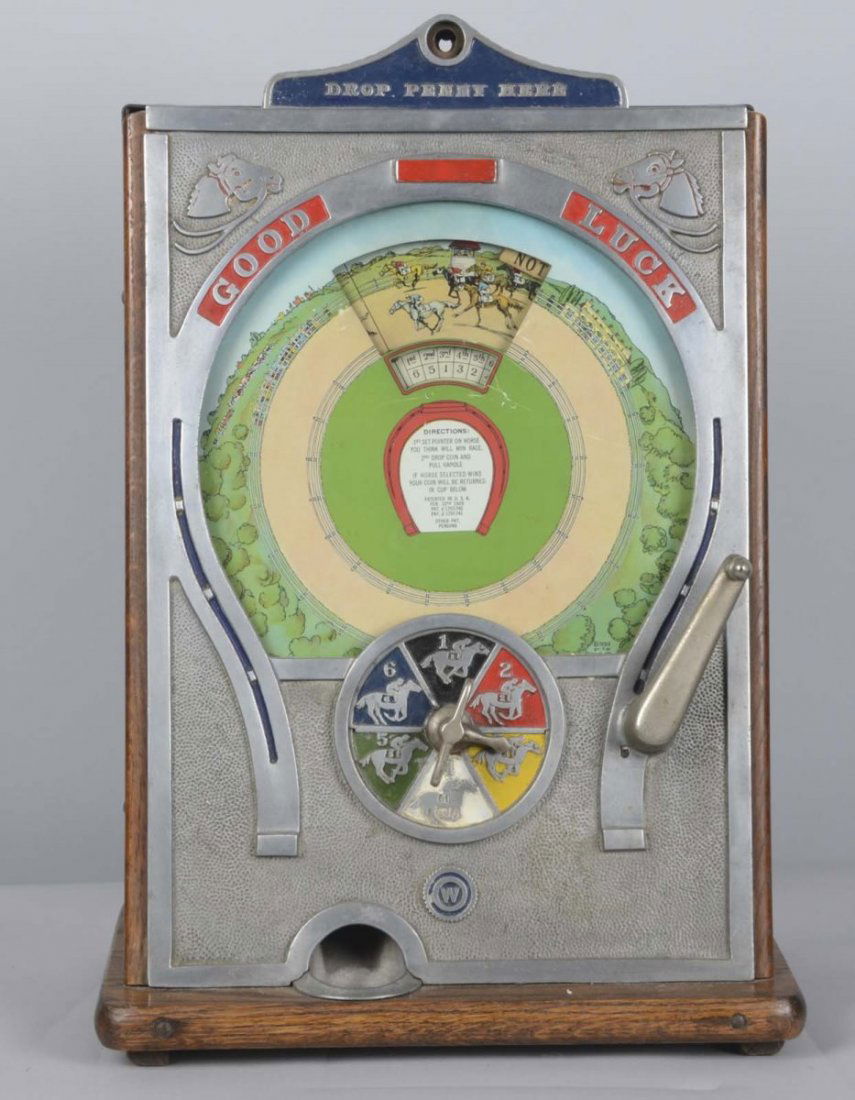 1¢ Watling Good Luck Counter Wheel Slot Machine: A very rare payout/coin return trade stimulator from the 1930s time period. A visually & quite unique trade stimulator, it has a front casting with a horse motif, intricate mechanism, great decals on