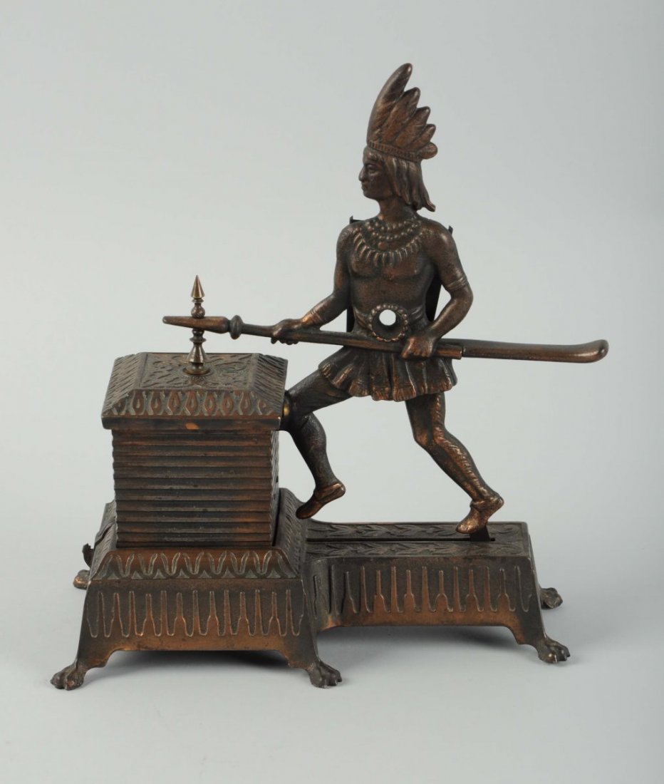 Indian Figural Cigar Cutter: Perhaps considered to be the epitome of all figural cast iron cigar cutters! This particular example is in virtually near mint undamaged all original condition with its great copper black oxide finish