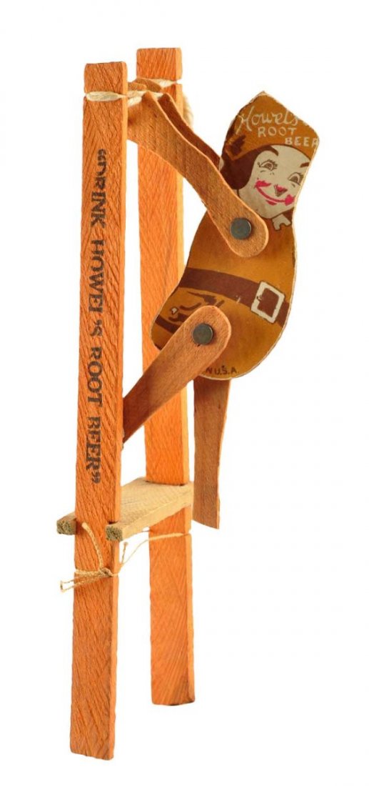 Scarce 1940's Howel's Root Beer Toy.: Paper and wood construction with some mild wear on the character figure. You never find these in this condition. 8.5 - 9. Condition (Excellent). Size 8 - 1/4" T.