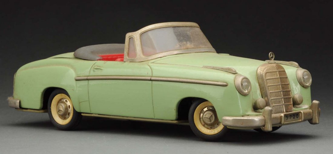 German Schuco Tin Mercedes 220S Convertible Coupe. (1 of 3)
