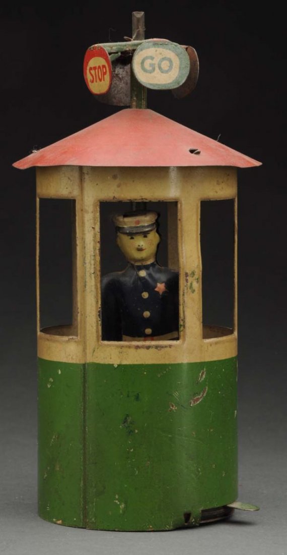 American-Made Police Officer in Tin Litho Stand. (1 of 2)