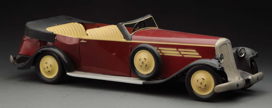 Contemporary Clockwork Tin Plate Paya Convertible. (1 of 3)