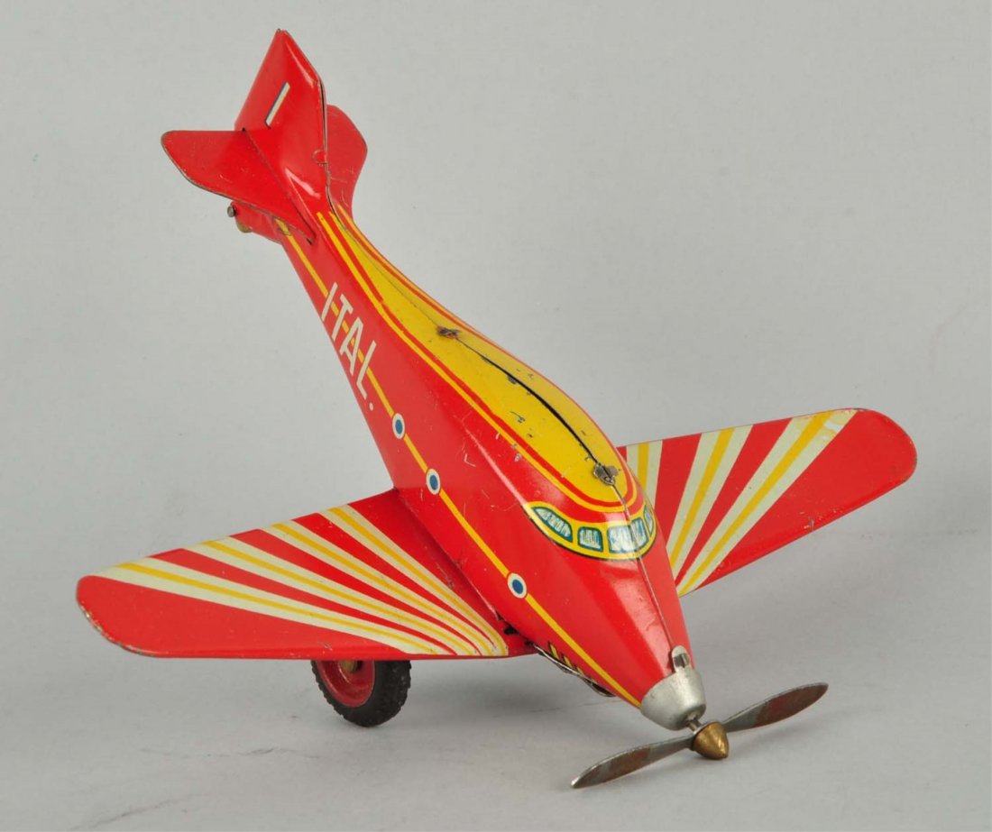 Italian Tin Litho Wind-Up Airplane Toy. (1 of 3)