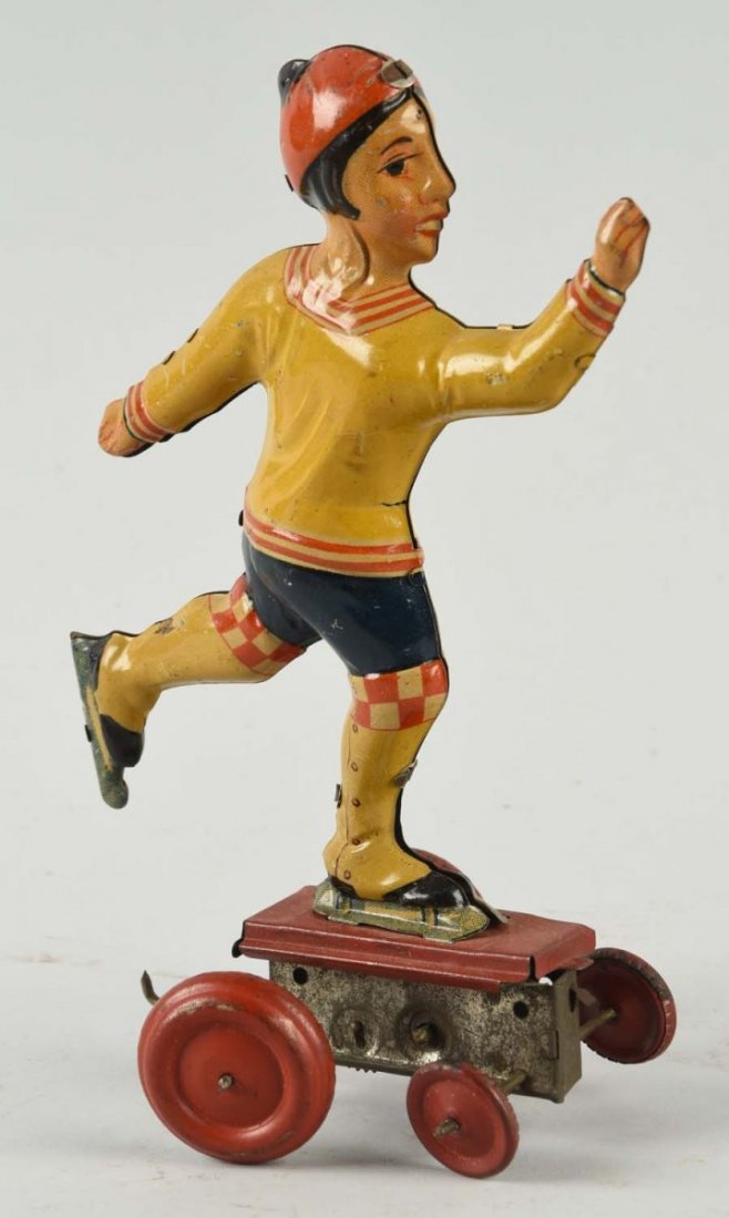 German Tin Litho Wind Up Ice Skating Woman. (1 of 2)