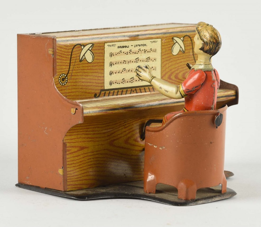Unusual German Tin Litho Piano Player Toy. (1 of 1)