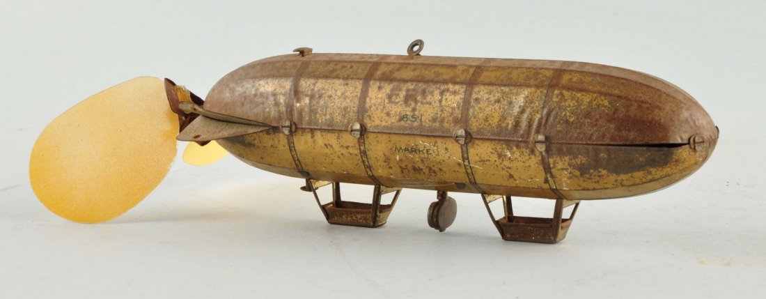 German Lehmann Tin Litho Wind-Up Zeppelin Toy. (1 of 5)