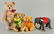 Four Button-in-Ear Steiff Brand Collectibles.