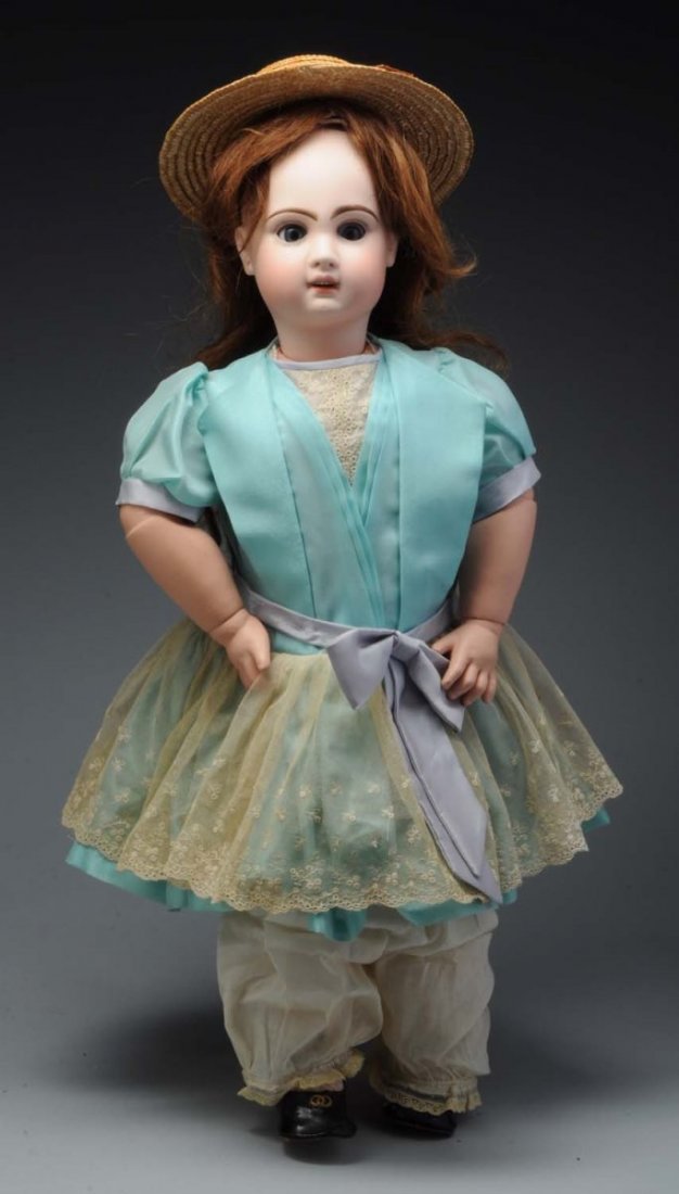French Jumeau Bébé Doll.: Creamy bisque socket head incised “12” with Jumeau checkmarks (1/2” firing flaw on rim), multistroked eyebrows, lushly painted eyelashes, sleeping eyes (need adjusting), open mouth with upper te