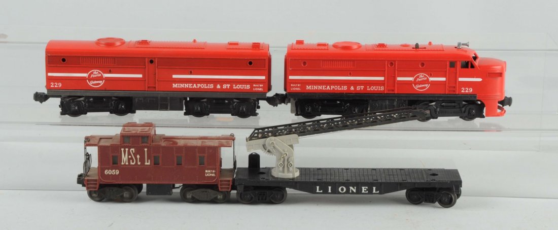 Lot of 4: Lionel 229 Minn/St. Louis A&B & Cars.: The 229 powered A unit is complete and all original with an intact coupler support bar. This locomotive is like new in every respect with a good clean original box with all flaps. 229 B unit is comple