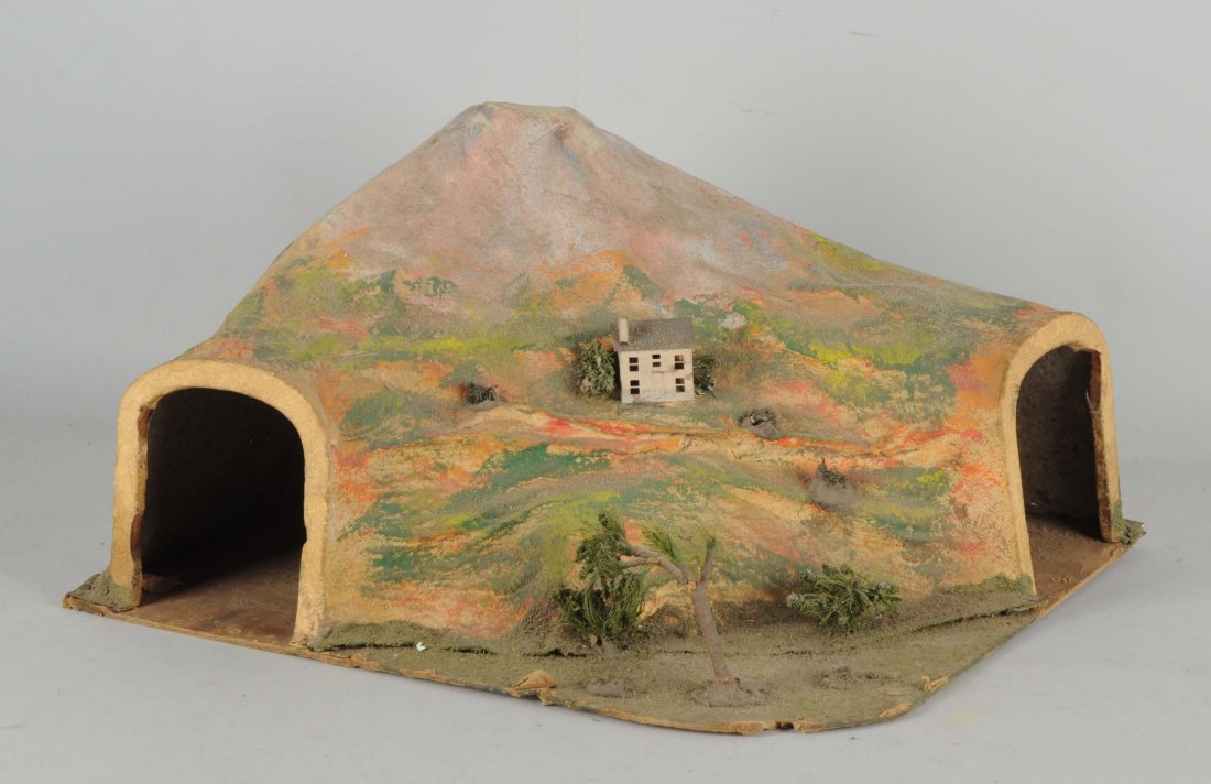 Lionel O Gauge Corner Tunnel.: Composition. Missing one tree, otherwise complete and all original. Condition (Excellent).