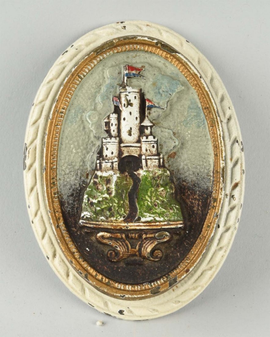 Cast Iron Small Castle Doorknocker.: Made by Judd Co. Lovely portrayal of a smaller castle in the woods. Condition (Excellent). Size 4" L.