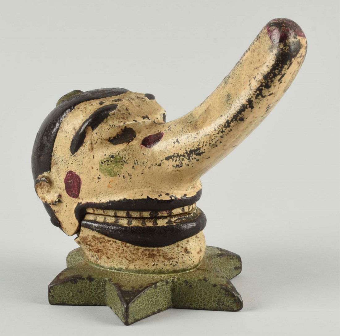 Rare Long Nose Cast Iron Clown Nutcracker.