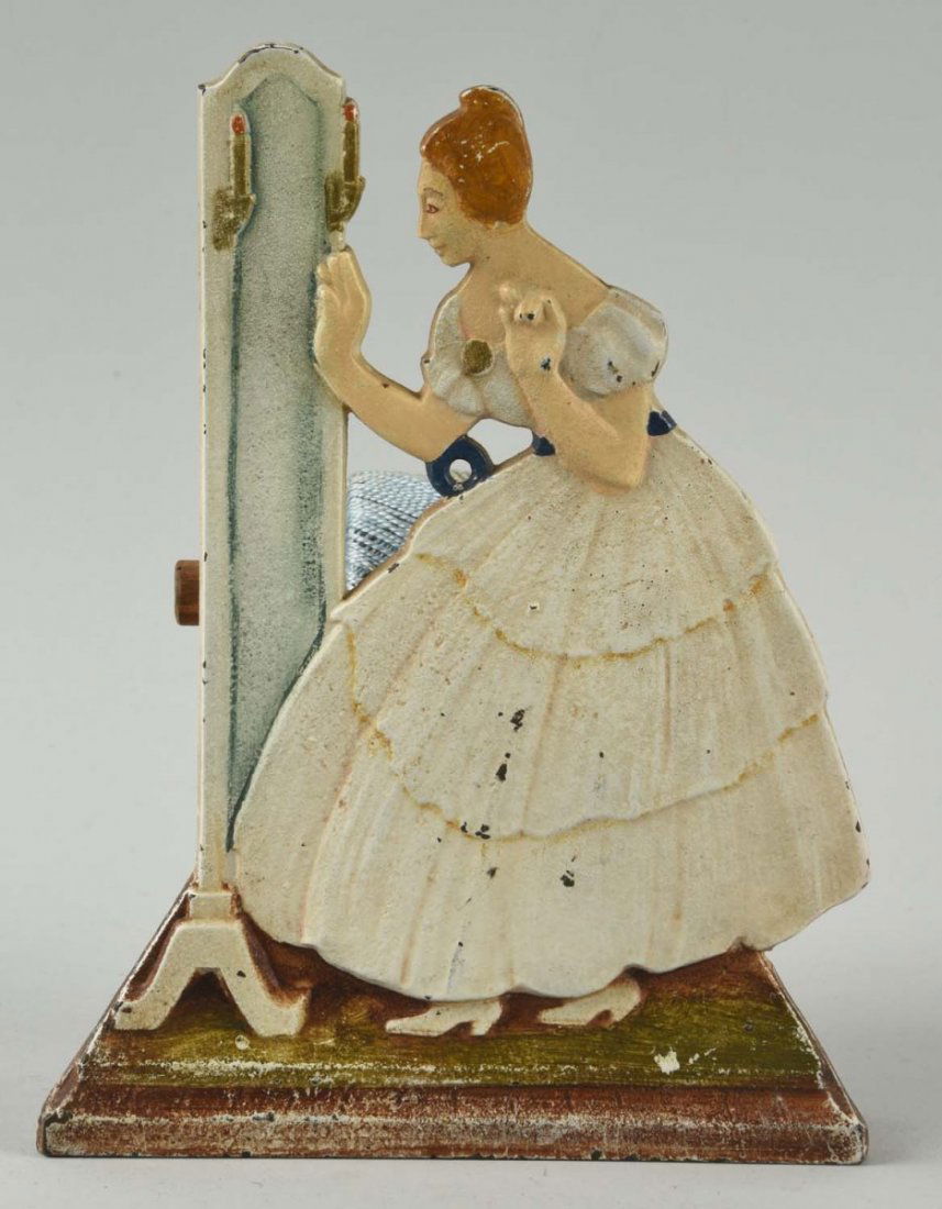 Cast Iron Lady Looking in Mirror String Holder. (1 of 2)