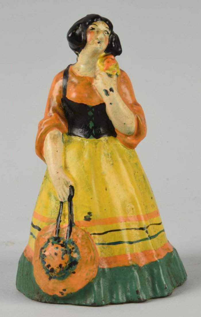 Cast Iron Lady Holding Hat Doorstop. (1 of 2)