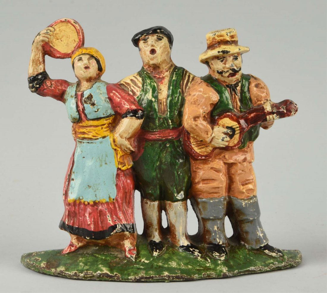 Cast Iron Street Singers Doorstop. (1 of 2)