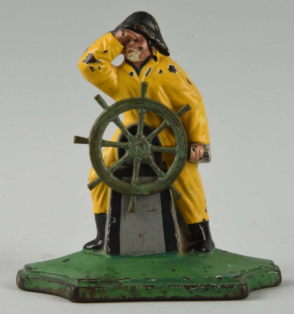 Cast Iron Gloucester Fisherman at Wheel Doorstop. (1 of 2)