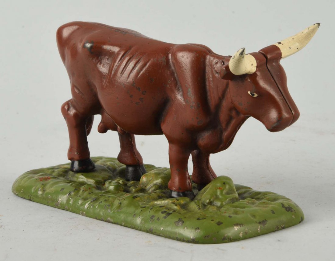 Very Scarce Milking Cow Still Bank. (1 of 2)