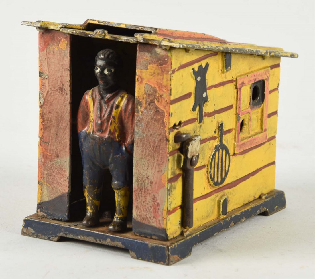 J. & E. Stevens Cabin Mechanical Bank. (1 of 2)