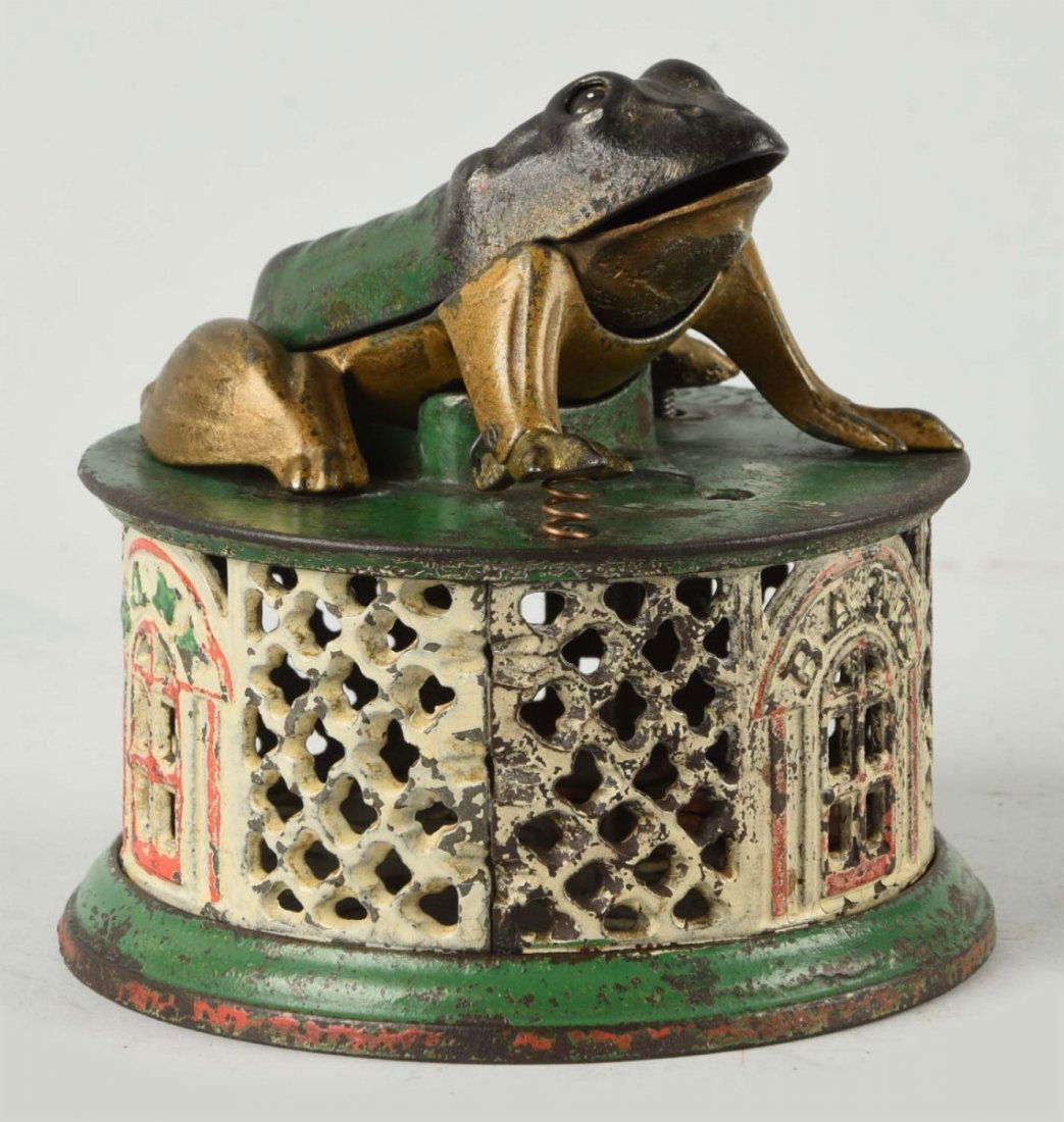 J. & E. Stevens Frog on Lattice Mechanical Bank. (1 of 2)