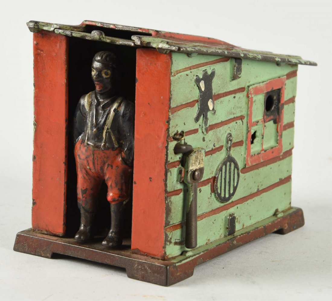 J.& E. Stevens Cabin Mechanical Bank. (1 of 2)