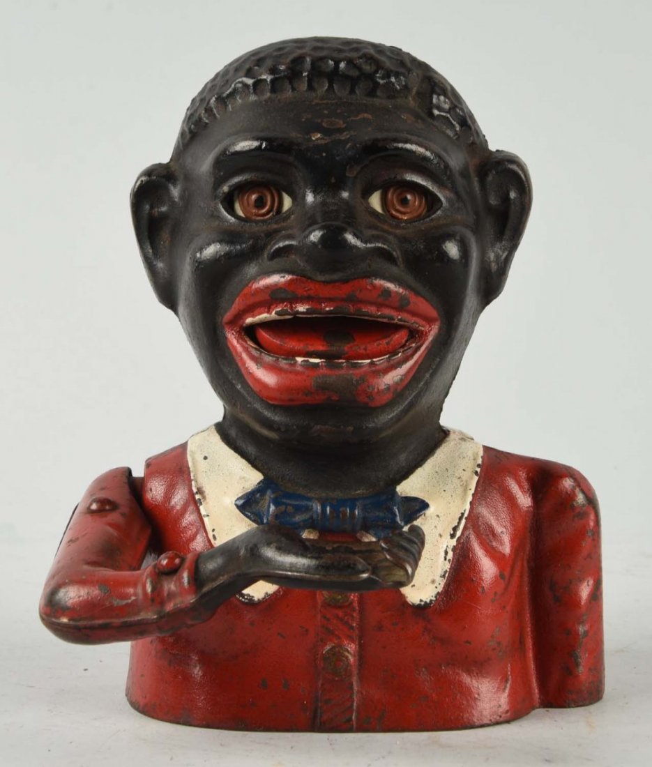 Harper Jolly "N" Mechanical Bank.: Front half and back half of figure blacklight differently. (JY). Condition (Very Good). Size 6 -1/2" T.