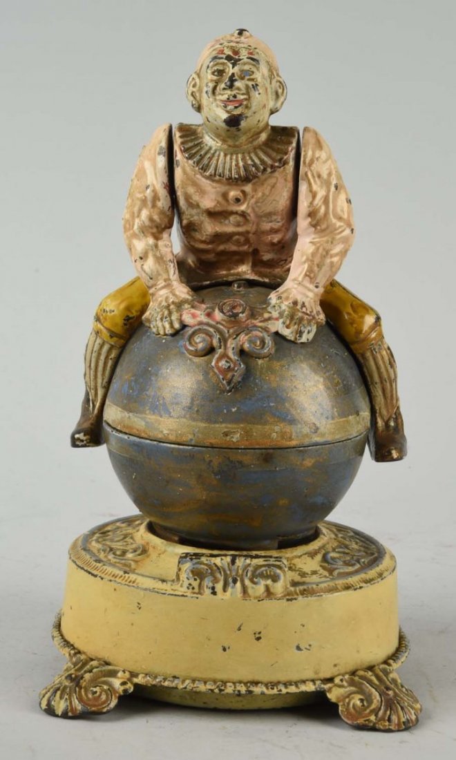 J. & E. Stevens Clown on Globe Mechanical Bank. (1 of 3)