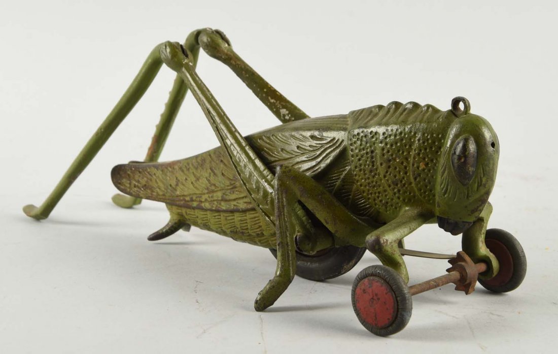 Cast Iron Hubley Grasshopper Toy. (1 of 2)