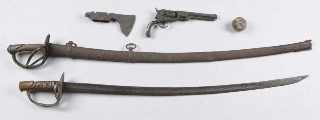 Lot of 5: Excavated Civil War Weapons.: Comprised of: 1) Excavated Colt pocket 49 revolver missing only the grips. 2) Cavalry saber with grips and wire. 3) cavalry saber with scabbard. 4) 6-1/2" diameter cannon ball. 5) Ax head. All locatio
