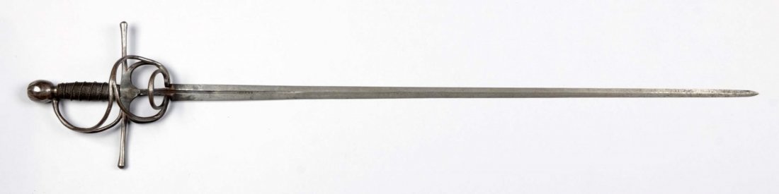 17th Century Swept Hilt Rapier.: Having a 33" tapered, straight blade of diamond section, the median ricasso marked: ?UDEUS. Cage hilt with breaker bar, finger openings and crossguard with integral knuckle-bow. Orb-shaped pommel. Wir