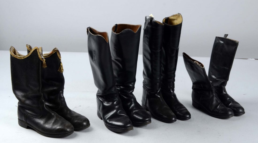 Lot of 4: Pairs of Reproduction Military Boots.: Comprised of: 1) Black leather military style boots. Shows wear but still in good condition. 2) Black leather military style boots with finger pull. Tag inside: "Made in USA" in excellent condition. 3