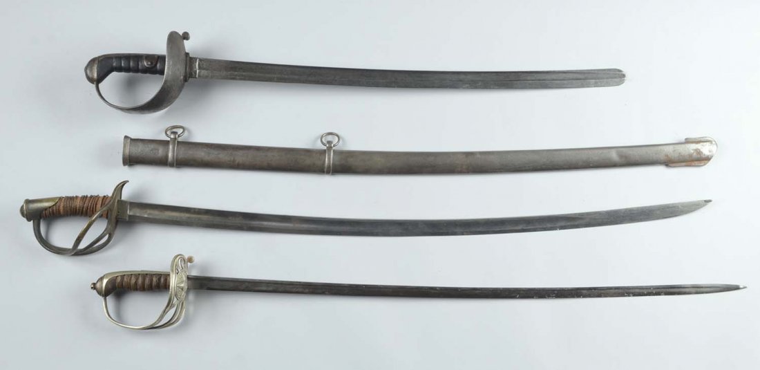 Lot of 3: Sabres.: Comprised of: 1) Heavy cavalry sabre has a 27-1/2” blade with one fuller with writing on the edge of blade “18XX”. Solid brass hilt with knuckle bar. Steel scabbard with two hanging rings and dr