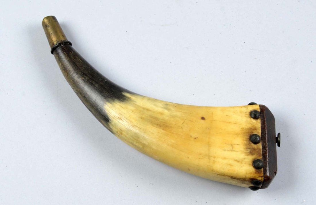 Identified Boston Tea Party Horn.: This powder horn is 11-3/8” x 2-15/16” at the base with a domed wood base held onto the horn by three large tacks on either side and two on the front and back. Carved into the right side is the le