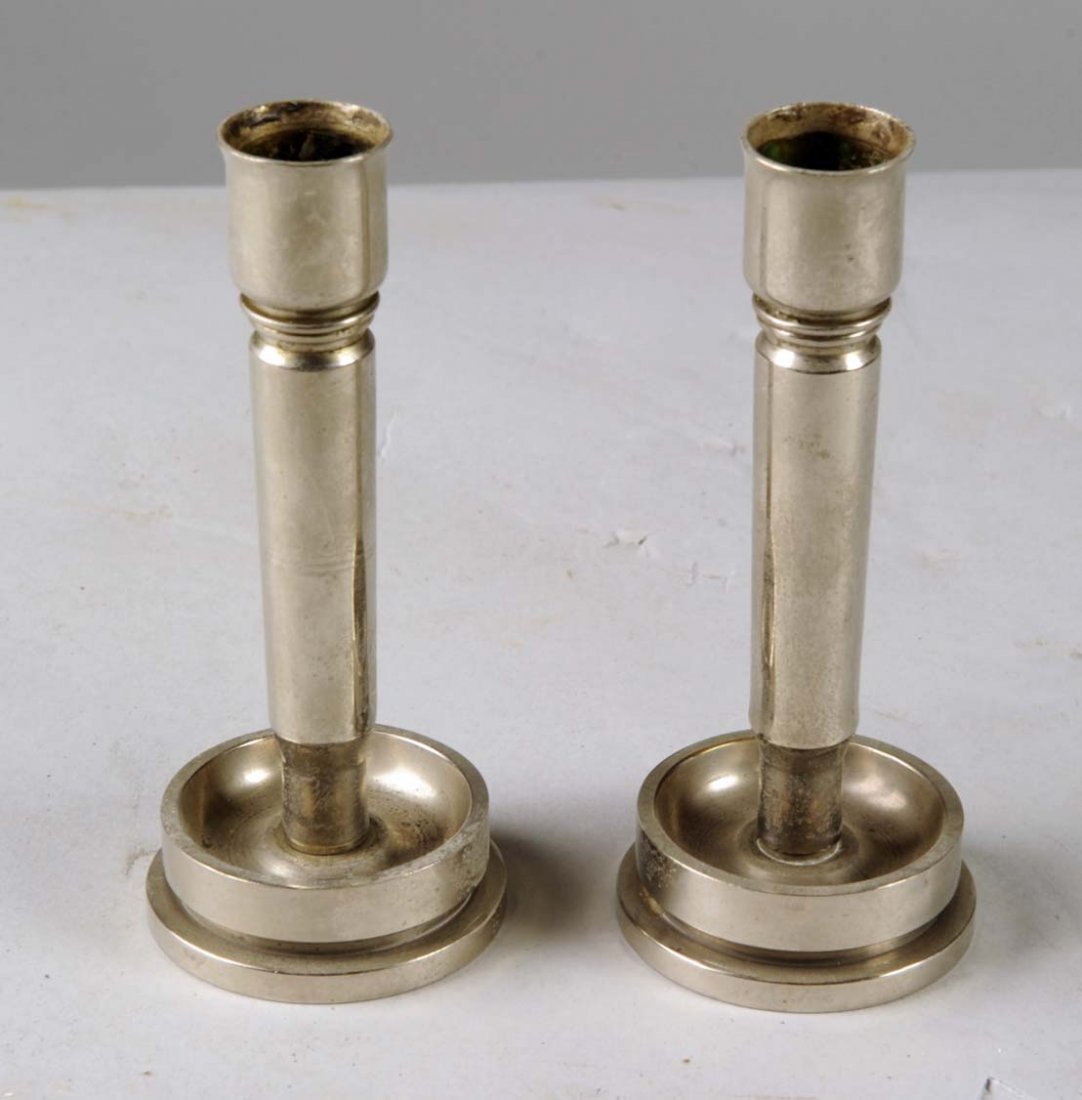 Lot Of 2: Artillery Ammunition Candlesticks: Each trench art candlestick easily separates into two pieces, a base made from a 40MM M25 casing dated 1943 and shaft. Condition (Very Good). Size 5-1/2" x 2-1/4"