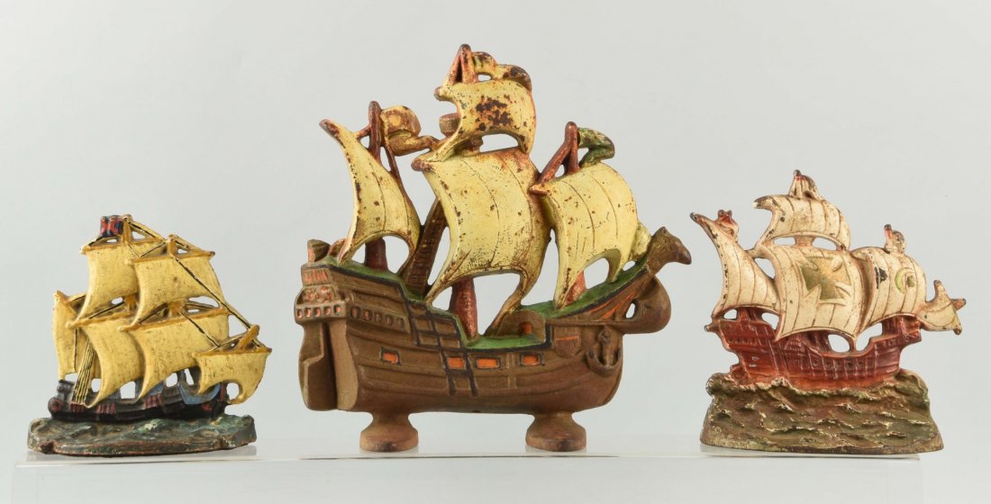 Lot of 3: Cast Iron Galleon Ship Doorstops.: Creations, etc. Condition (Good). Size Largest: 11 - 1/4" T.