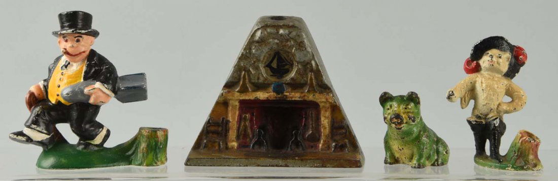 Lot of 4: Cast Iron Assorted Pencil Holders. (1 of 1)