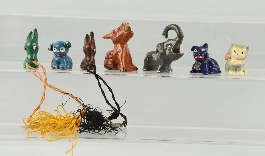 Lot of 7: Cast Iron Assorted Pencil Holders. (1 of 1)