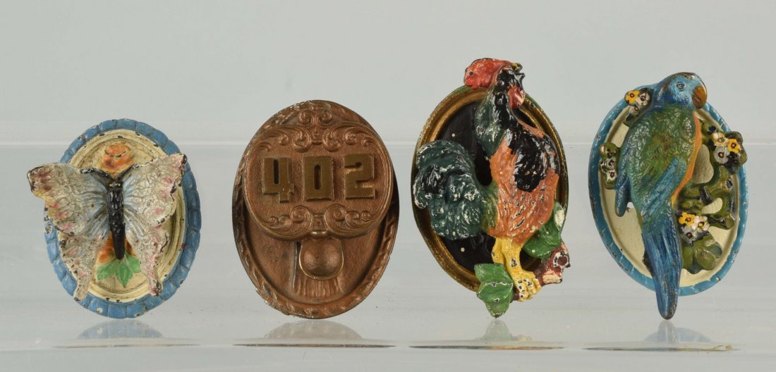 Lot of 4: Cast Iron Assorted Doorknockers.: Including Rooster, Butterfly, Room No. 402, and reproduction Parrot. Condition (Good - Excellent). Size Largest: 4 - 1/2" T.