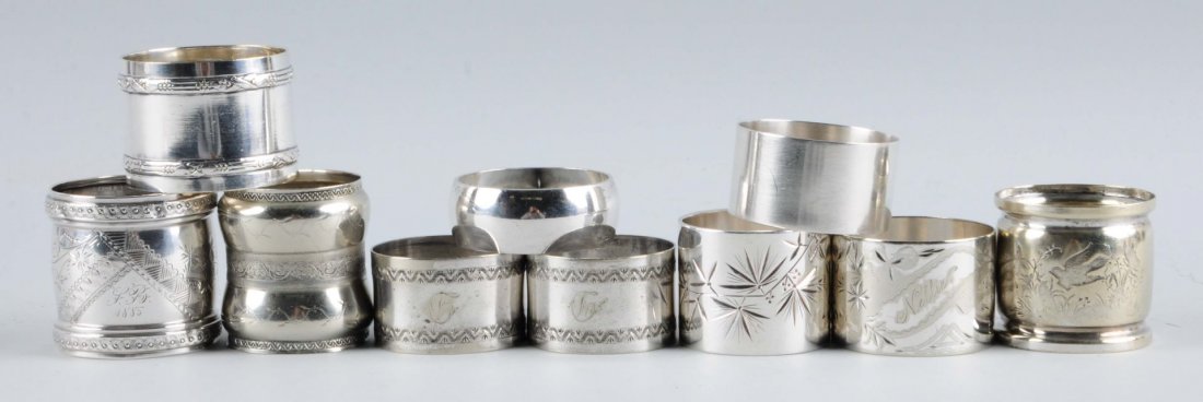 Lot of 10: Vintage Napkin Rings.: One in 800 silver, one sterling rest or silver plate. Condition (Excellent). Size Largest: 1 - 3/4" T.