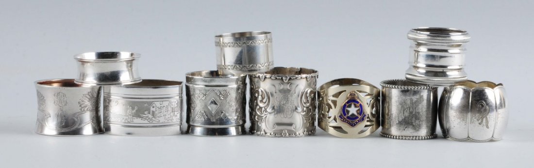 Lot of 10: Intricate Silver Napkin Rings.: Several sterling. Most are silver plate with minor wear for age. Condition (Excellent). Size Largest: 1 - 3/4" T.